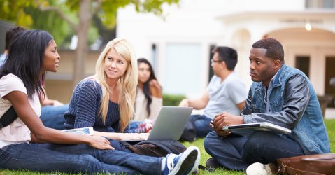 Group Of University Students Working Outside Together