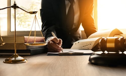 Lawyer working contract papers wooden gavel court justice law attorney
