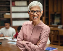 Older woman in university library