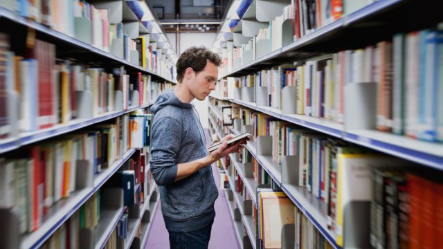 student at a library