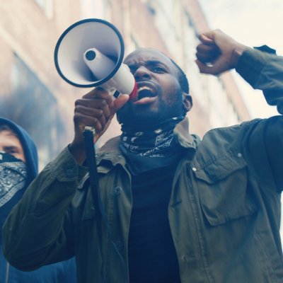 Protester speaking into megaphone