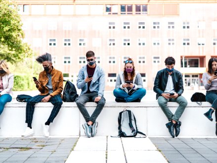 College students sitting on bench