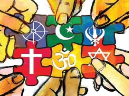 World religions represented as puzzle pieces being put together by hands with different skin colors