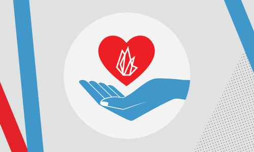 Hand holding a heart with the FIRE logo inside