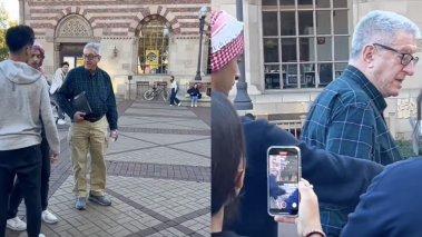 University of Southern California professor John Strauss speaks to protesters at a pro-Palestinian event on USC's campus.